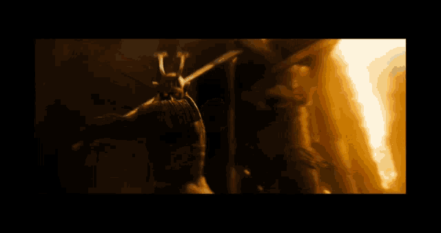 a group of people are fighting a monster in a dark room