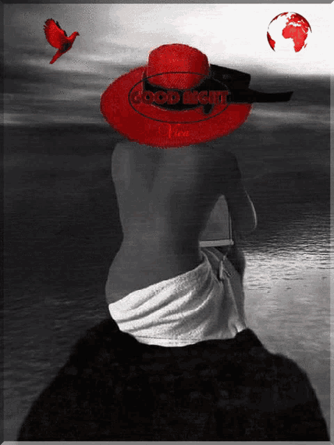 a black and white photo of a woman with a red hat and the words good night