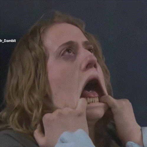 a close up of a woman 's face with a caption that says ' r_dambit '