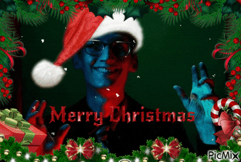 a picture of a man wearing a santa hat with the words merry christmas
