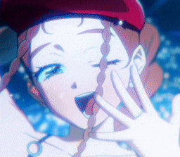 a close up of a girl 's face with a red hat