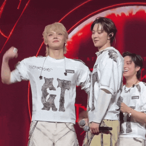 a man wearing a white shirt that says gt