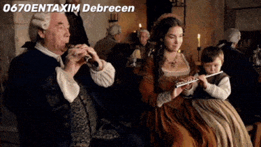 a man plays a flute while a woman plays a flute and a boy plays a flute