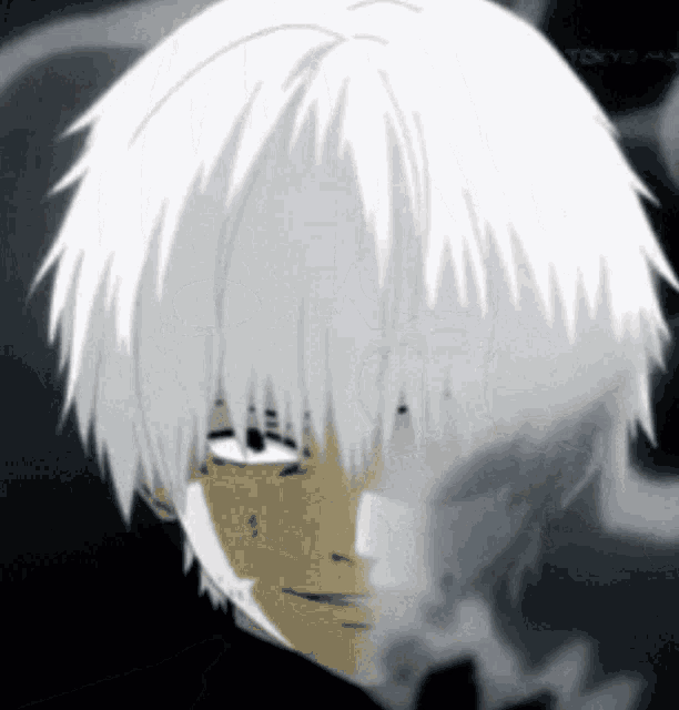 a close up of a person 's face with tokyo written on the bottom