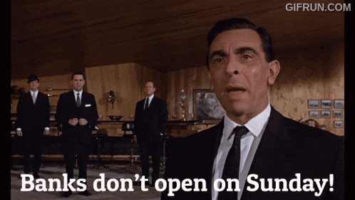 a man in a suit and tie says " banks don 't open on sunday "