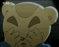a teddy bear with a scary face is covering his eyes
