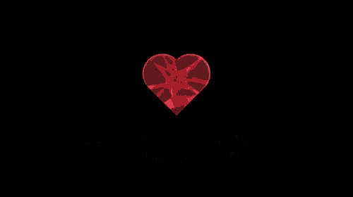 a bunch of red objects are flying in the air on a black background