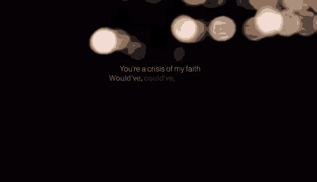 a line of lit candles with the words and i damn sure never would 've danced with the devil below them