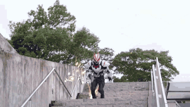 a person in a superhero costume is walking up stairs