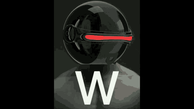 a person wearing a black helmet with the letter w on the bottom