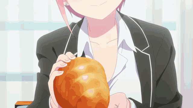 a girl in a suit is holding a loaf of bread in her hand