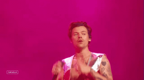 Licking Fingers Harry Styles GIF - Licking Fingers Harry Styles Coachella GIFs