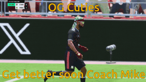 a soccer player with a bandana on his head is walking on the field with the words get better soon coach mike