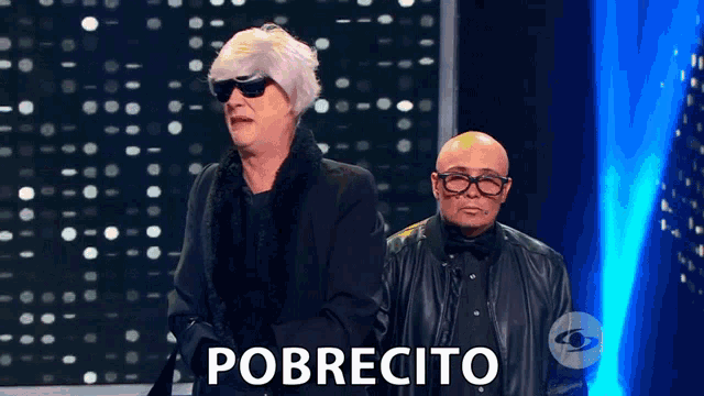 a couple of men standing next to each other with the word pobrecito on the bottom