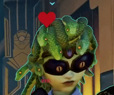 a cartoon character with snakes on her head has a red heart on her head