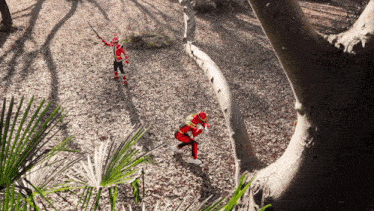 a man in a red and black outfit is holding a sword