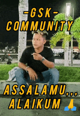 a man sits on a curb in front of a palm tree with the words " gsk community assalamu alaikum " above him