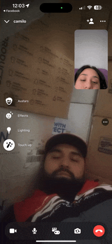 a man and a woman are having a video call on their cell phone
