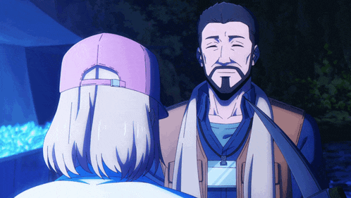 a man with a beard stands next to a woman wearing a pink baseball cap