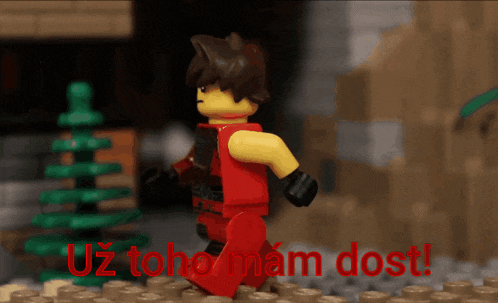 a lego figure with the words uz toho mam dost written in red