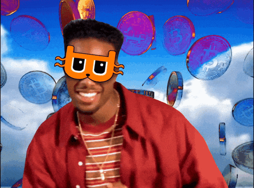 a man wearing a mask with the letter b on it is smiling