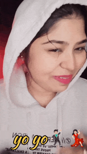 a woman wearing a white hoodie with the words yo yo on it