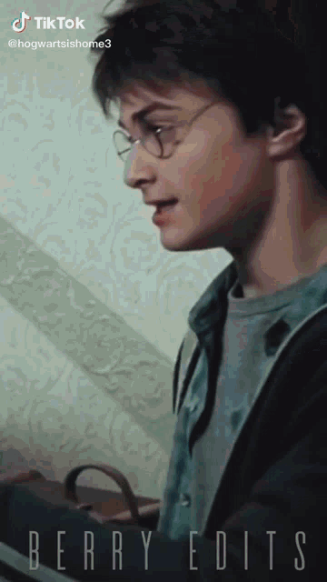 a picture of harry potter with the words berry edits on the bottom right