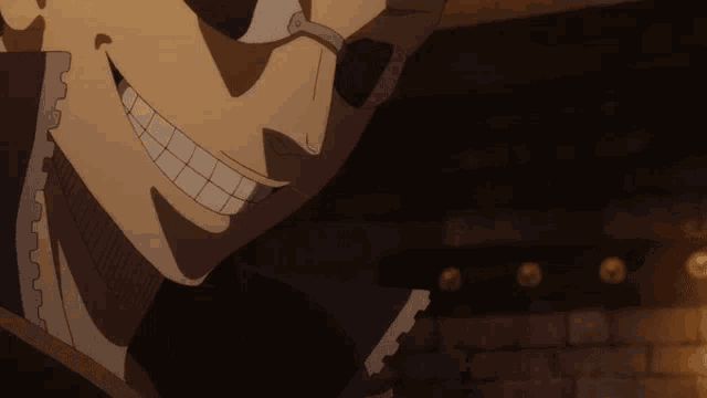 a close up of a man 's face with a big smile on his face