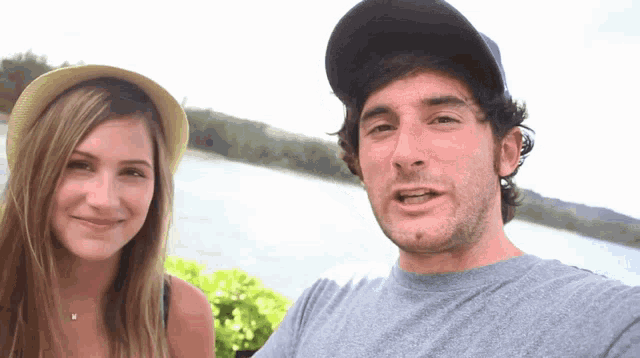 a man and a woman are posing for a picture together