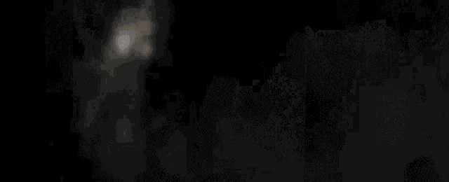 a close up of a fire burning on a black background