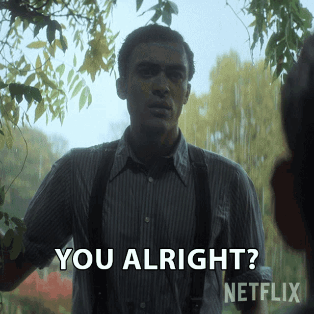 a man in a striped shirt says you alright
