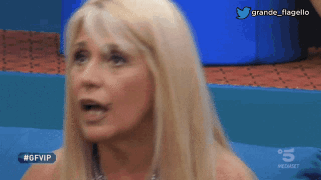 a close up of a woman 's face with the hashtag #gfvip on it