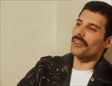 Freddie Mercury Nod GIF - Freddie Mercury Nod Talking GIFs