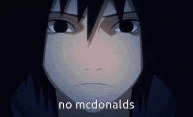 a close up of a person 's face with the words " no mcdonalds " on the bottom