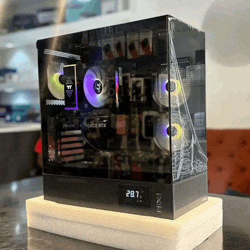 a pny force rtx computer sitting on a white foam cushion