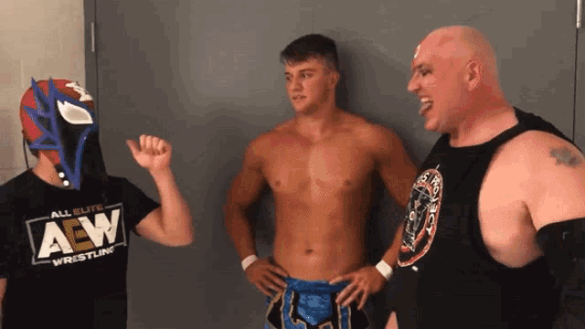 a man wearing a shirt that says aew wrestling