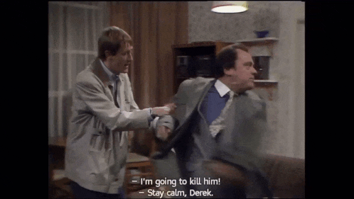 two men are fighting in a living room and one of them says i 'm going to kill him !