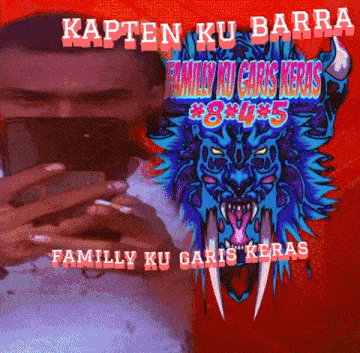 a man taking a picture of himself with the words kapten ku barra family ku garis keras 8 4 5