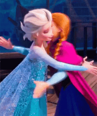 elsa and anna are hugging each other in a frozen scene .