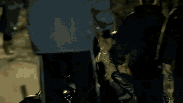 a man standing next to a motorcycle with a bloody face