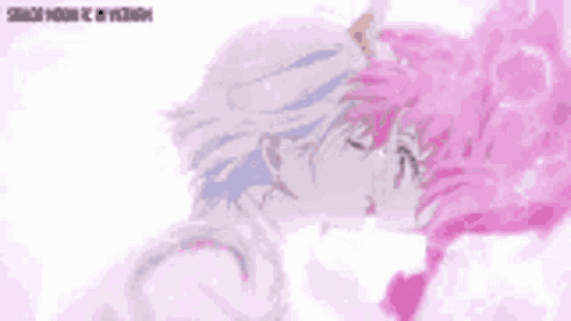 a boy and a girl are kissing in a cartoon .