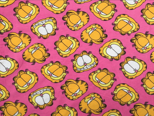 a pink background with garfield 's face on it