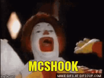 a mcdonald 's clown is screaming with the words mcshook written above him