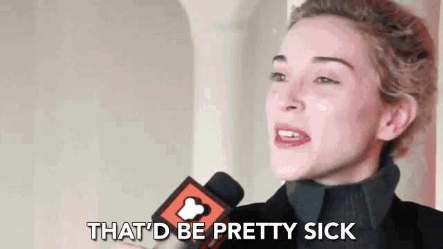 a woman talking into a microphone with the words that 'd be pretty sick below her