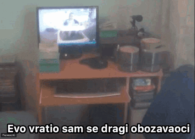 evo vratio sam se dragi obozavaoci is written on a screen