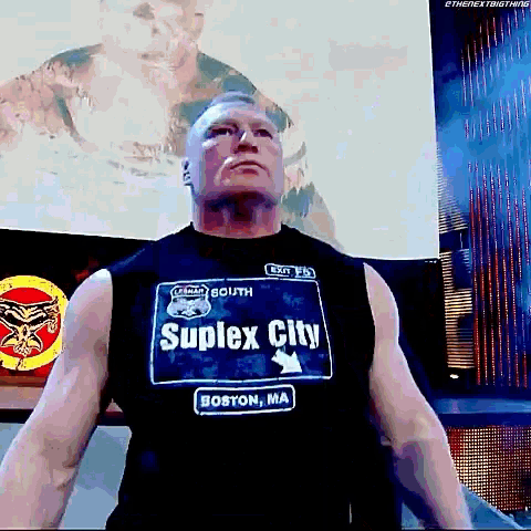 a man wearing a shirt that says suplex city
