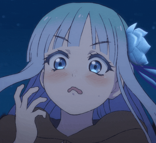 a girl with a flower in her hair is making a funny face