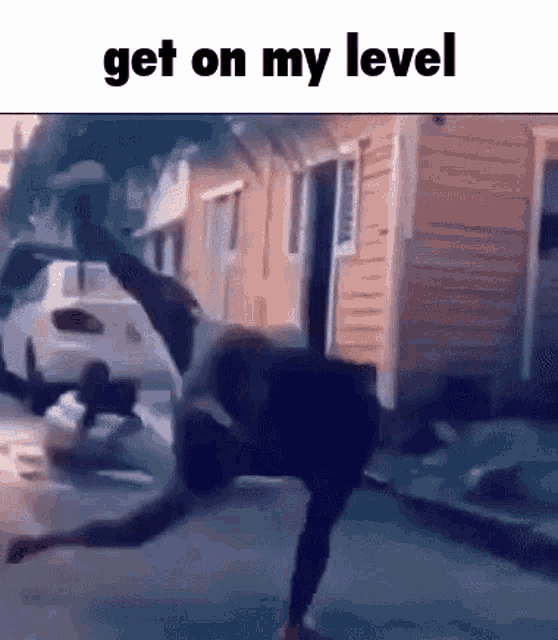 a man is bending over in front of a car with the door open and the words `` get on my level '' written on the bottom .