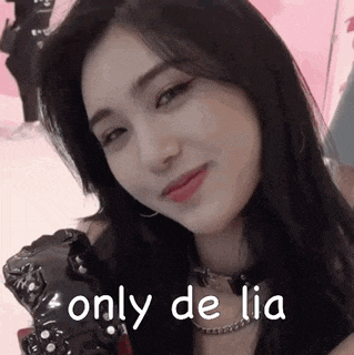 a close up of a woman 's face with the words `` only de lia '' written on the bottom .