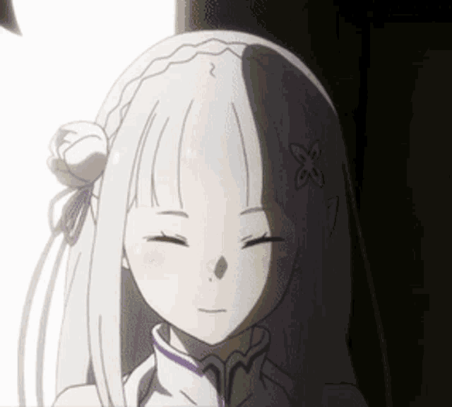 a girl with white hair and a butterfly in her hair is smiling with her eyes closed .